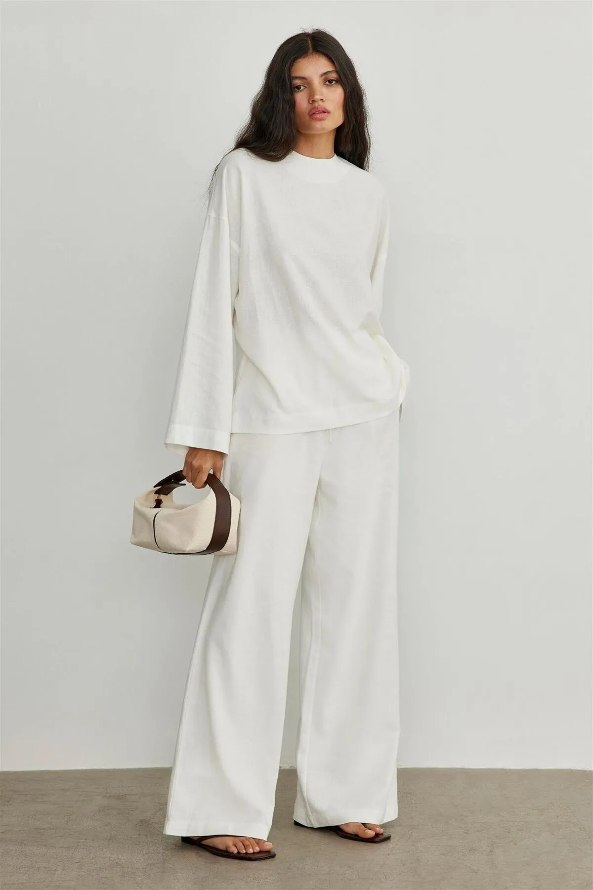 Suud Collection  Bitterbraune Archi Mini-Tasche