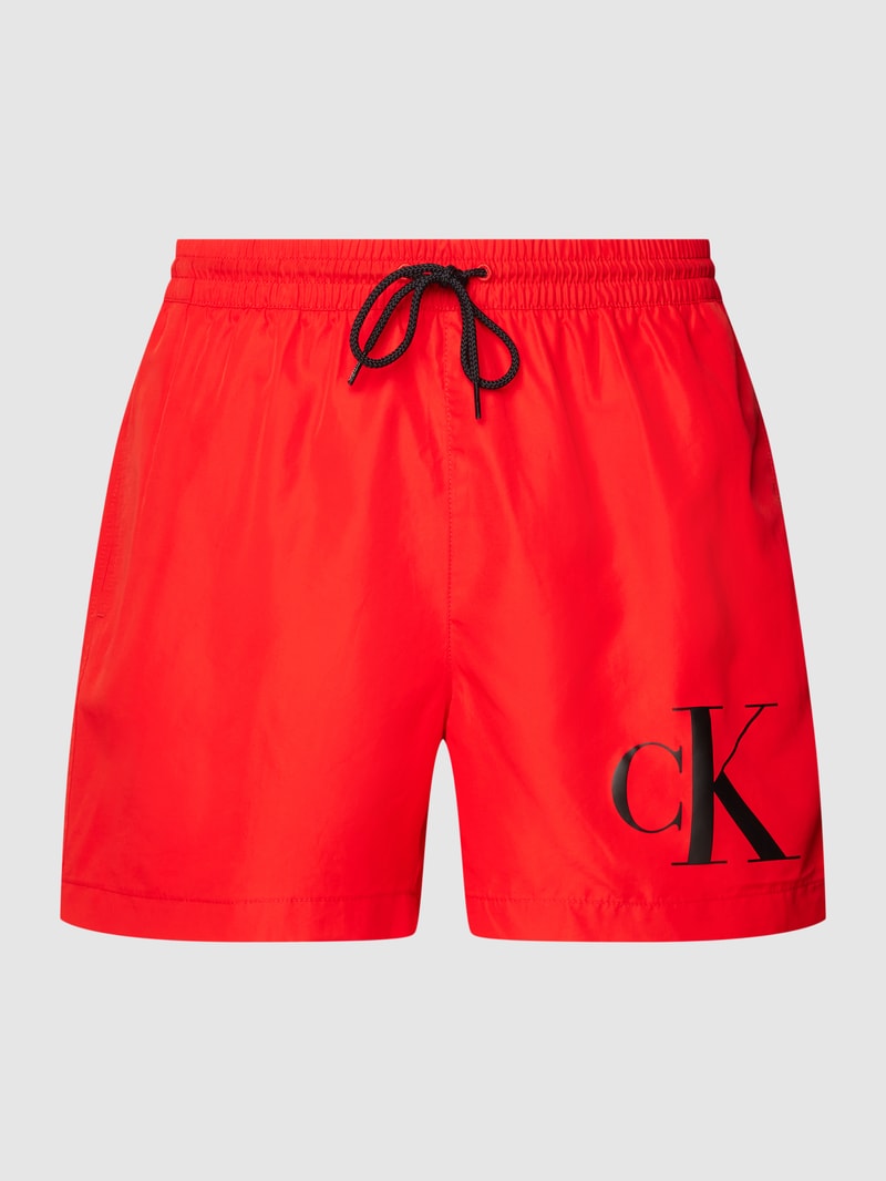 Badehose und Strandtuch im Set in rot