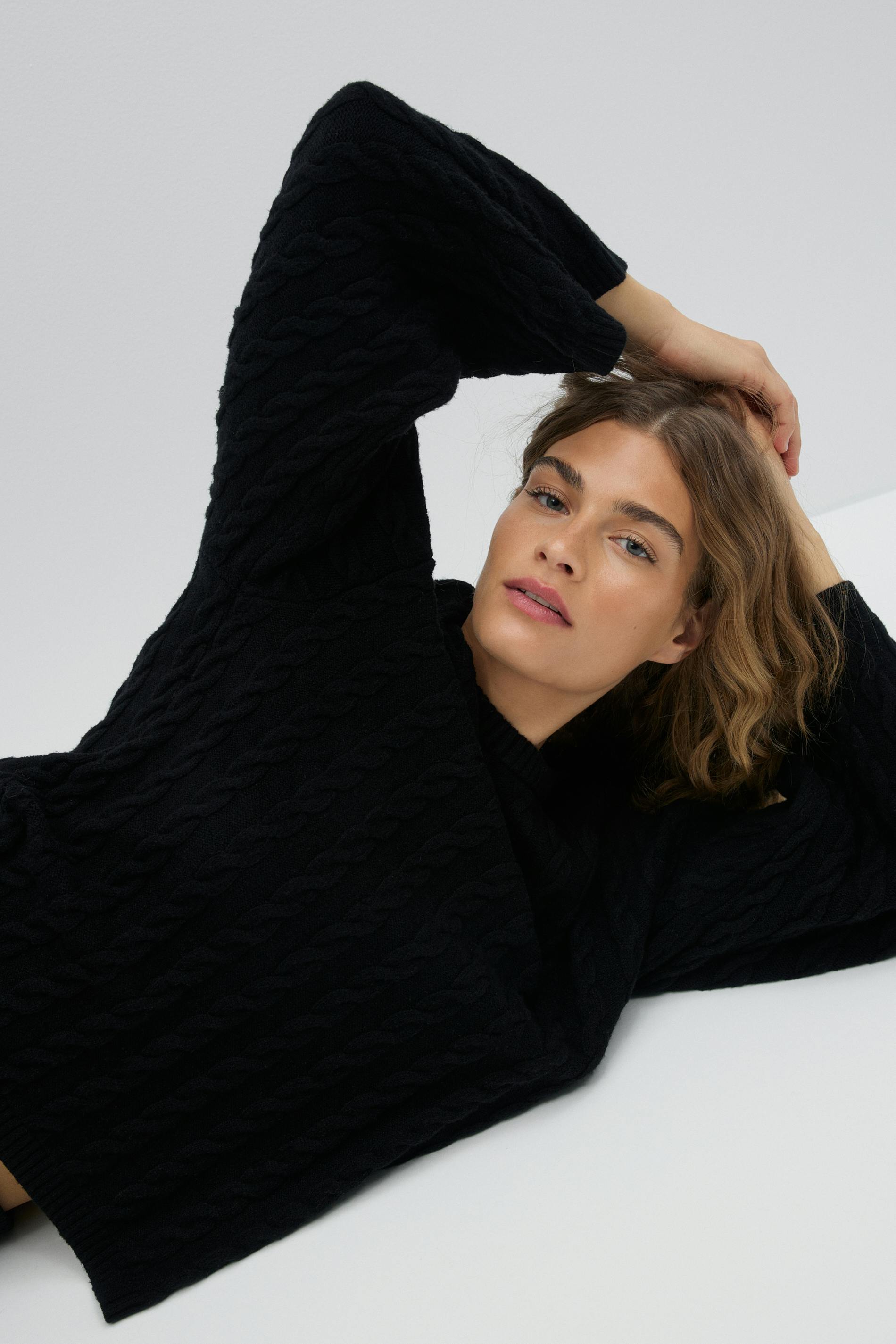 Knitted cable sweater