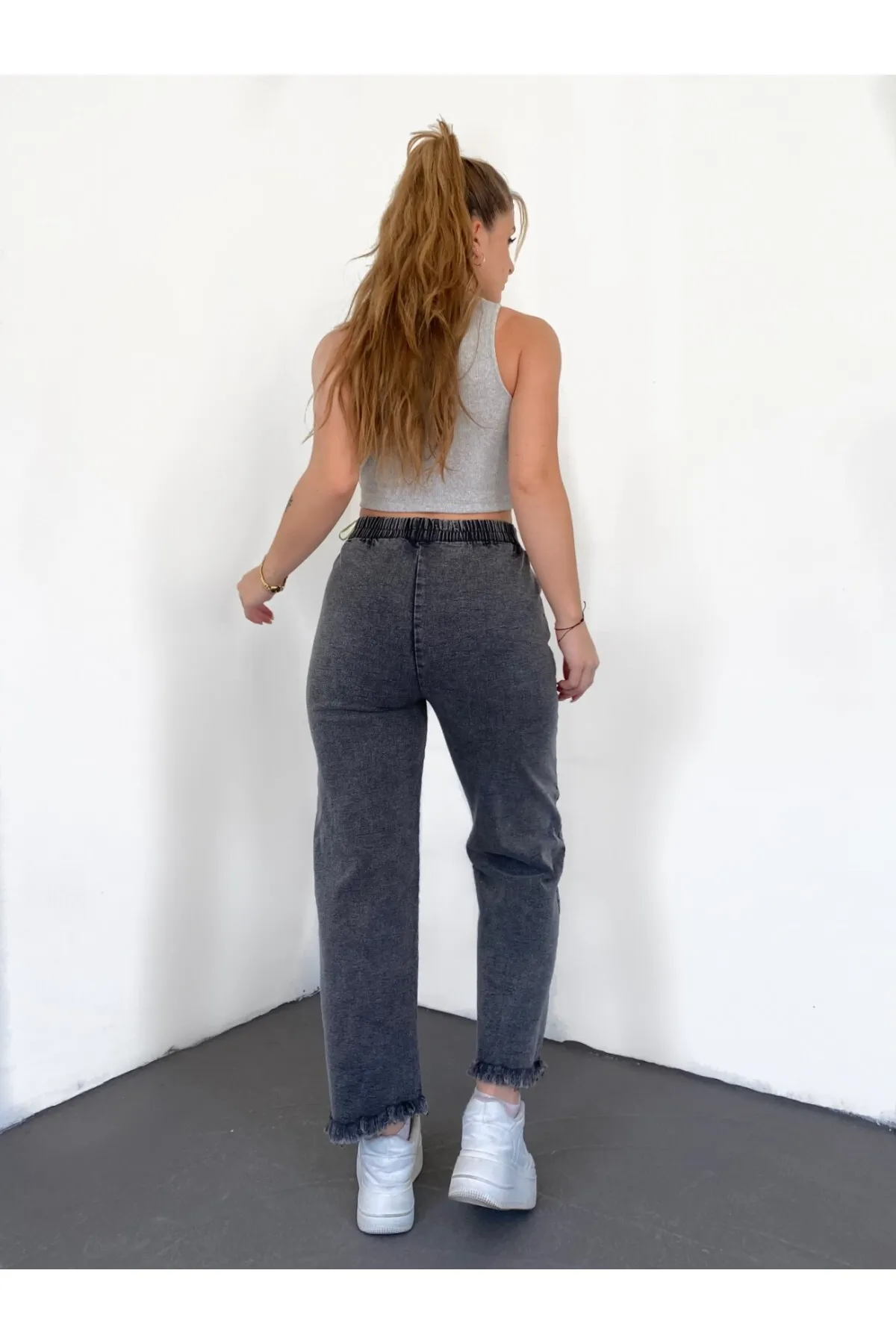 Modamorfo  Jeans mit Gürteldetail und Quasten