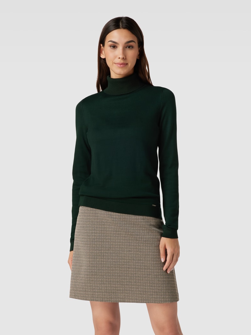 Rollkragenpullover in unifarbenem Design mit Label-Detail in bottle