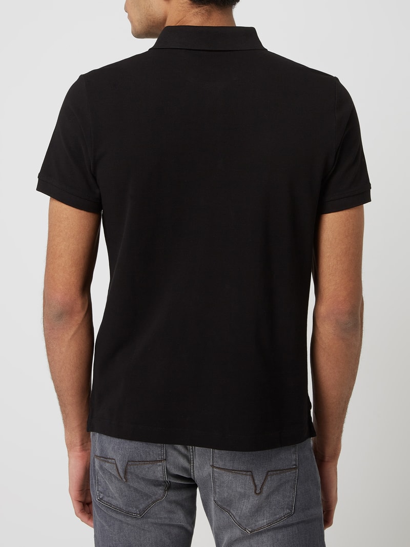 Regular Fit Poloshirt aus Baumwolle in schwarz