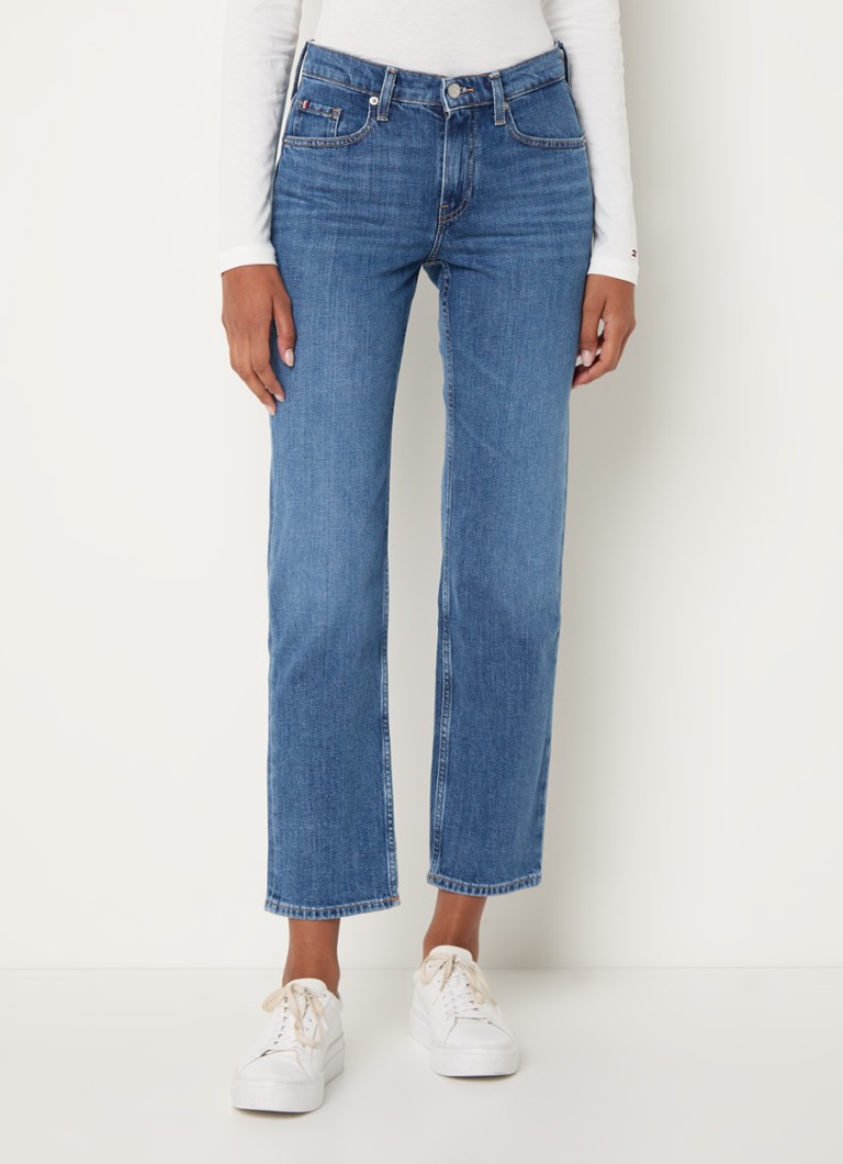 Calça jeans Tommy Hilfiger de cintura alta e perna reta com lavagem média.