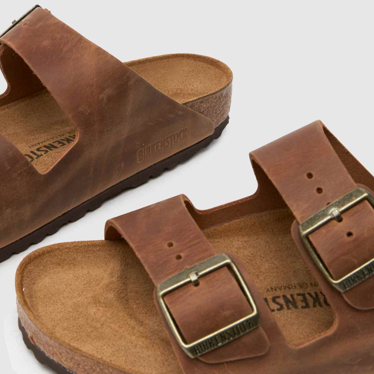 BIRKENSTOCK Arizona – Cognacfärgade lädersandaler med olja
