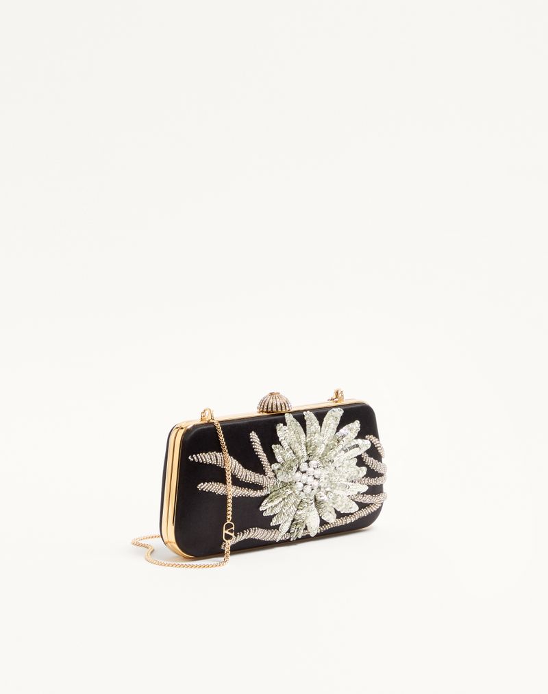 Bolsa Valentino Garavani Carry Secrets em cetim com bordado floral