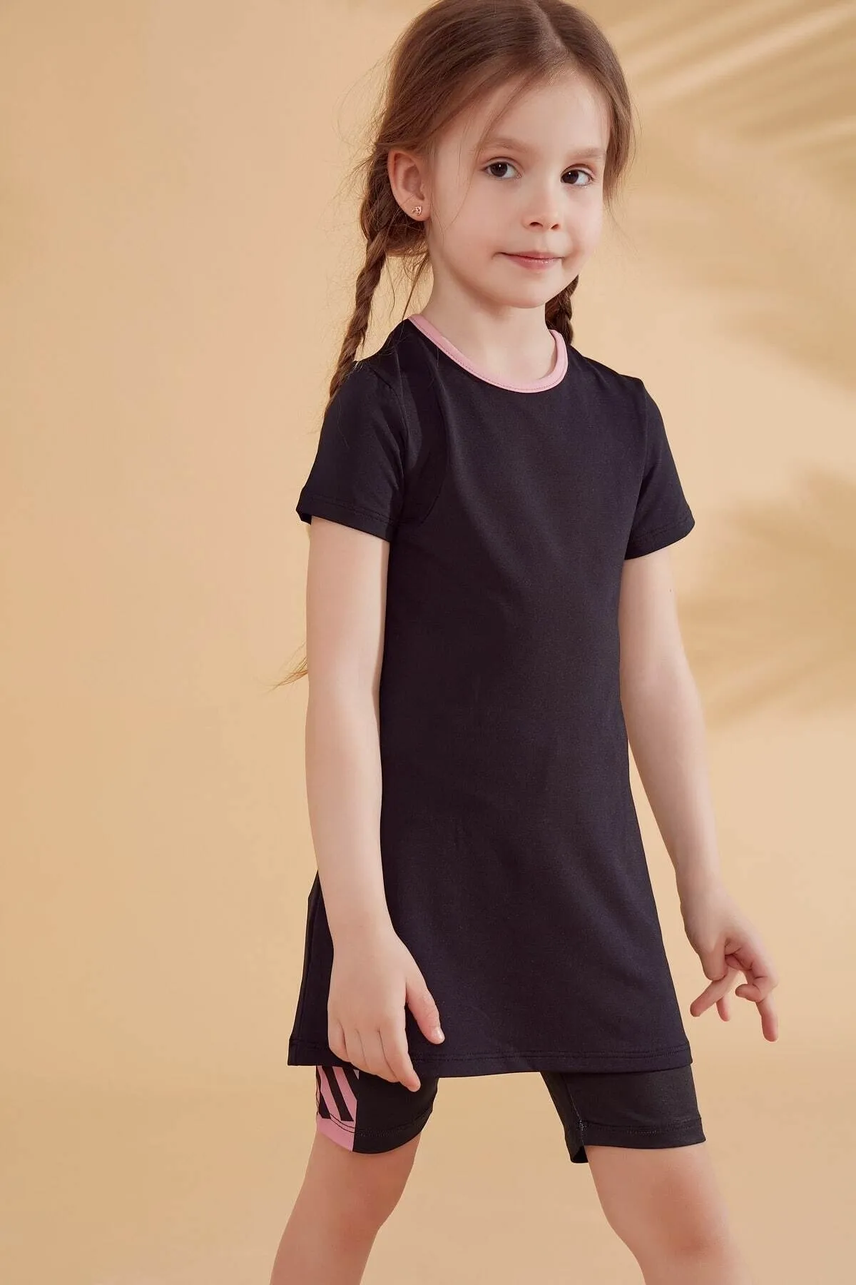 Marina  Schwarzer Kinder-Badeanzug mit Strumpfhose K2336