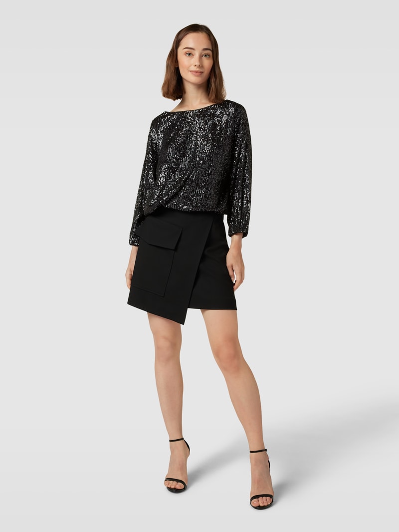 Bluse mit Paillettenbesatz in schwarz