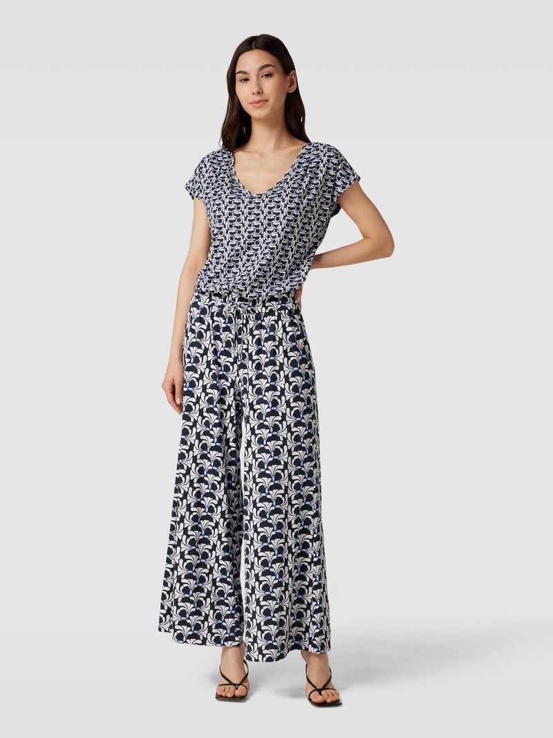 Jumpsuit mit Allover-Muster in blau
