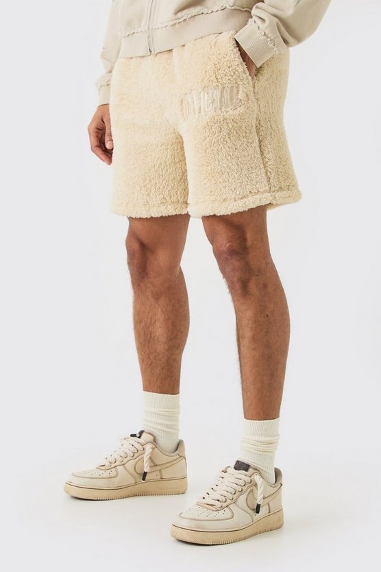 Lockere mittellange Shorts mit Borg-Stickerei