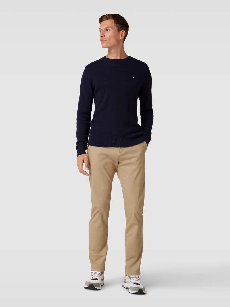 Stoffhose mit französischen Eingrifftaschen in beige