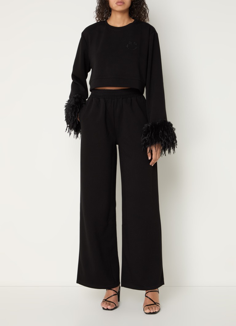 Spodnie Molly z wysokim stanem, szerokimi nogawkami i kieszeniami bocznymi, marki Refined Department.