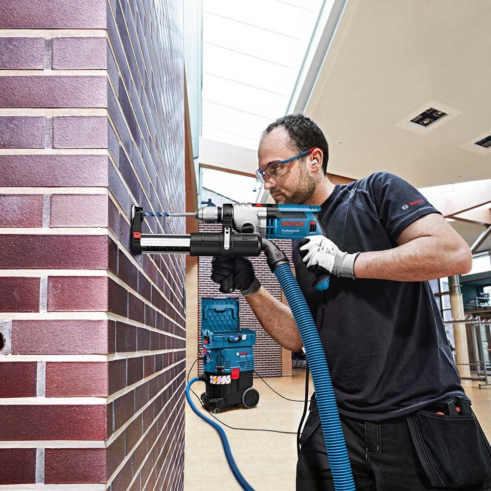 Acessório para furadeira de impacto BOSCH com sistema de extração de poeira.