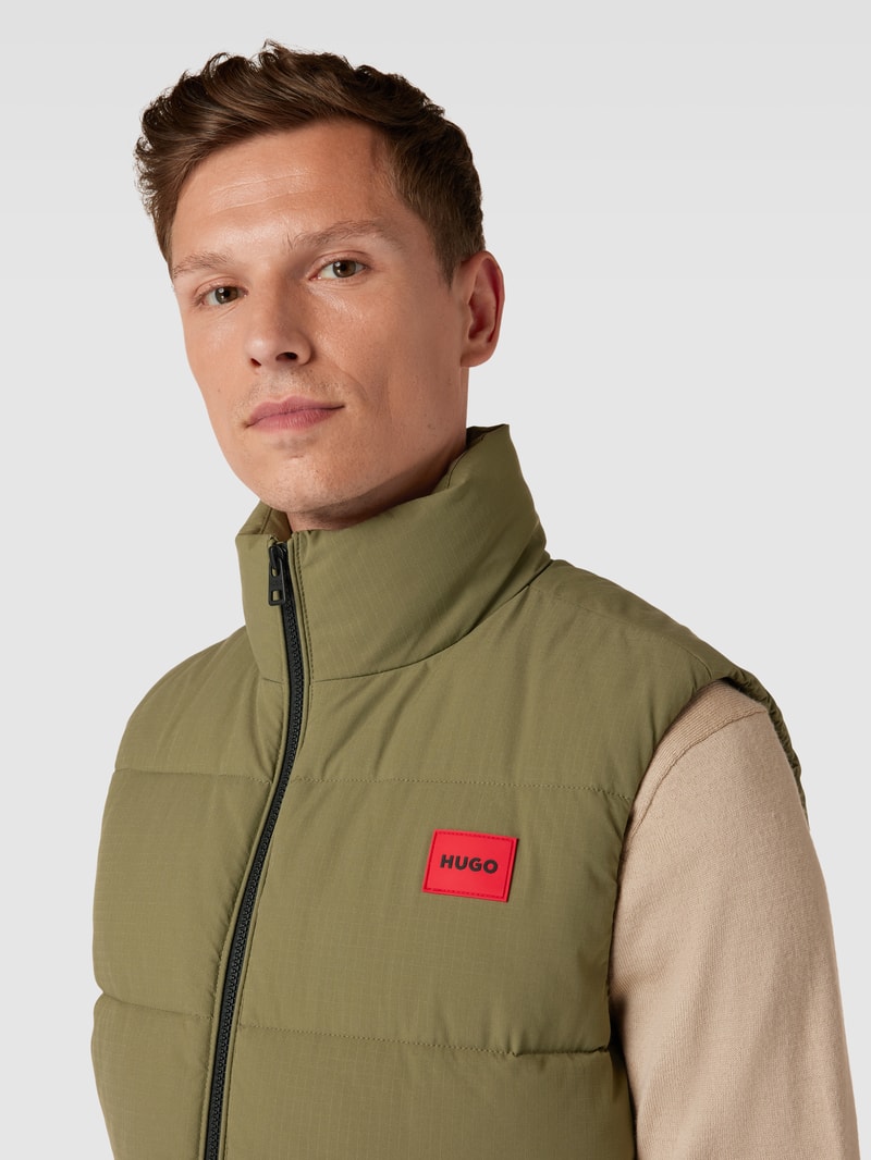 Steppweste mit Label-Patch Modell 'Baltino' in olivgrün