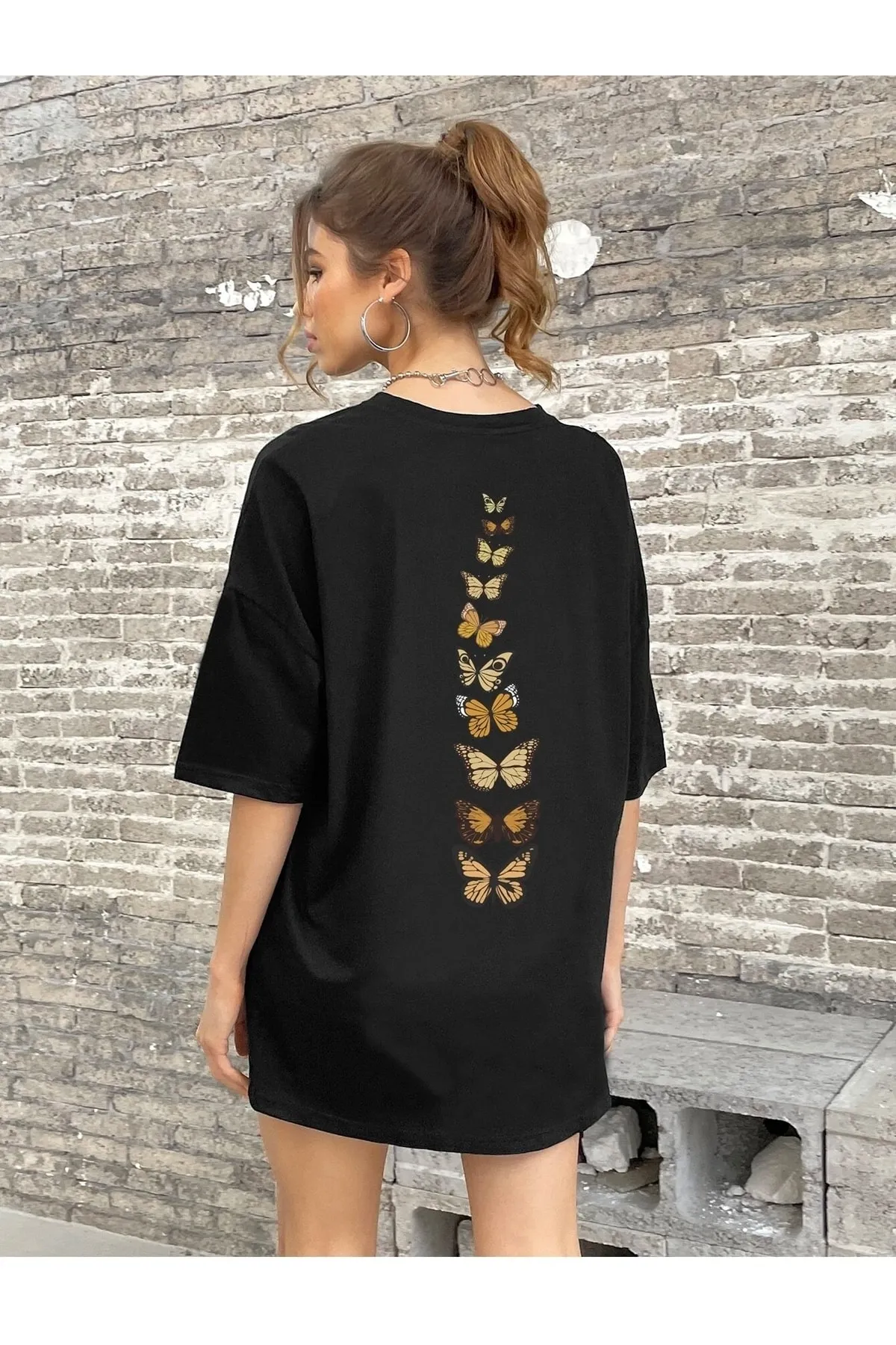 Know  Schwarzes Oversize-T-Shirt mit vertikalen Schmetterlingen für Damen