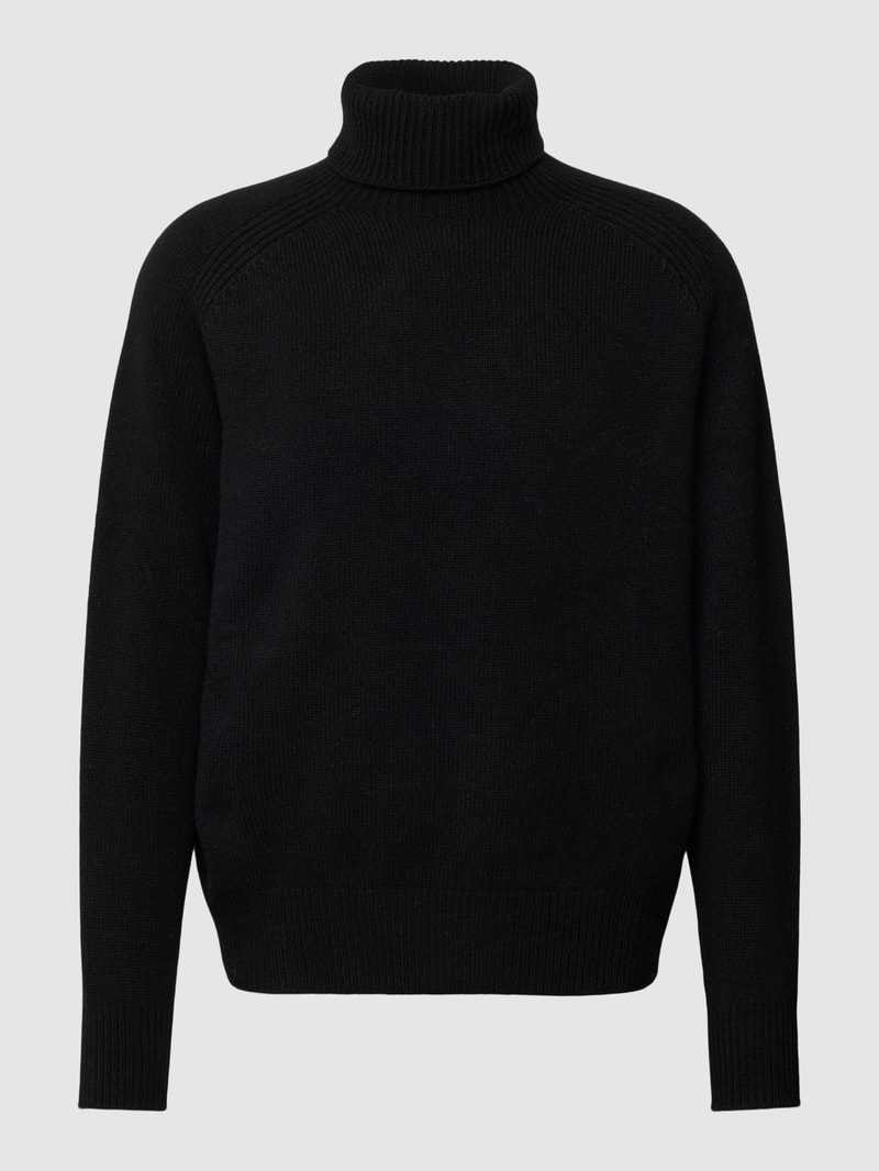 Rollkragenpullover aus Schurwolle in unifarbenem Design in schwarz
