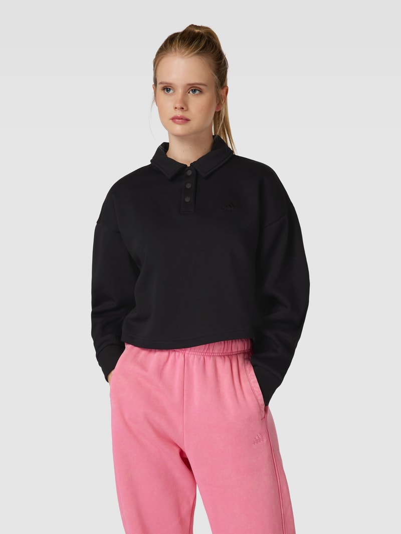 Cropped Sweatshirt mit rückseitigem Label-Print in schwarz