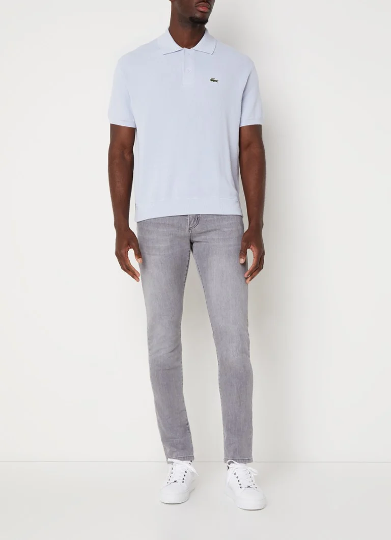 Tricou polo Lacoste Comfort Fit din bumbac piqué cu logo brodat.