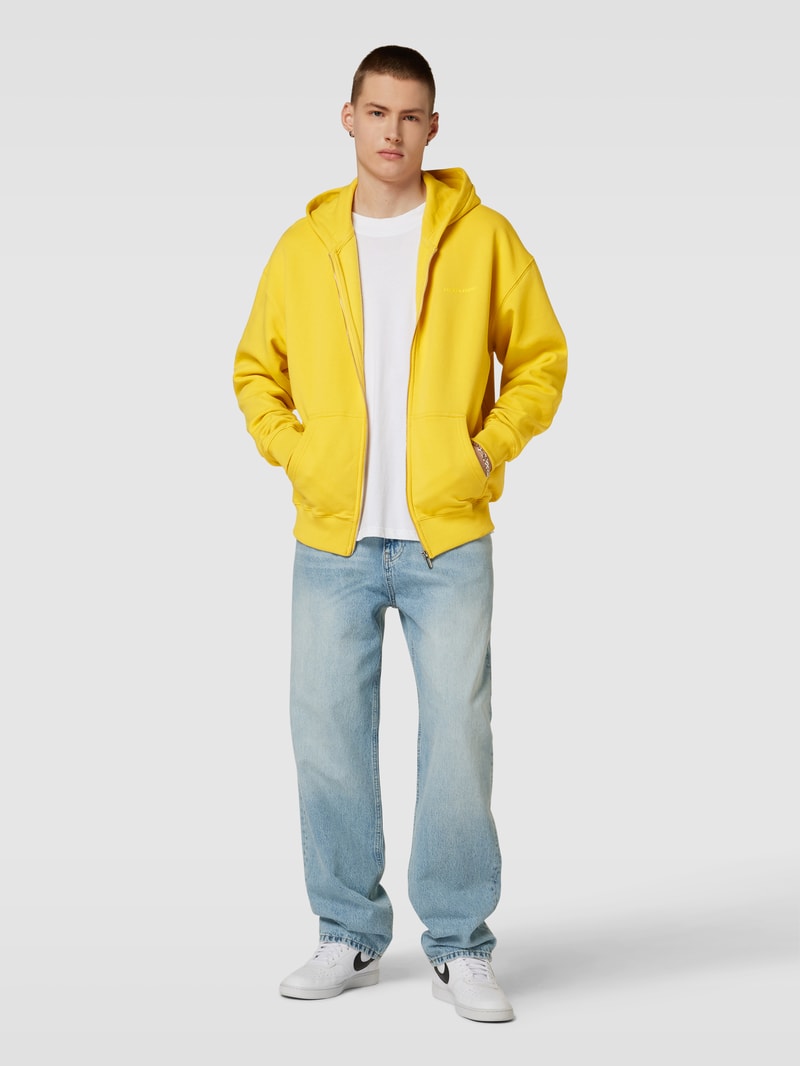 Sweatjacke mit seitlichen Eingrifftaschen in gelb