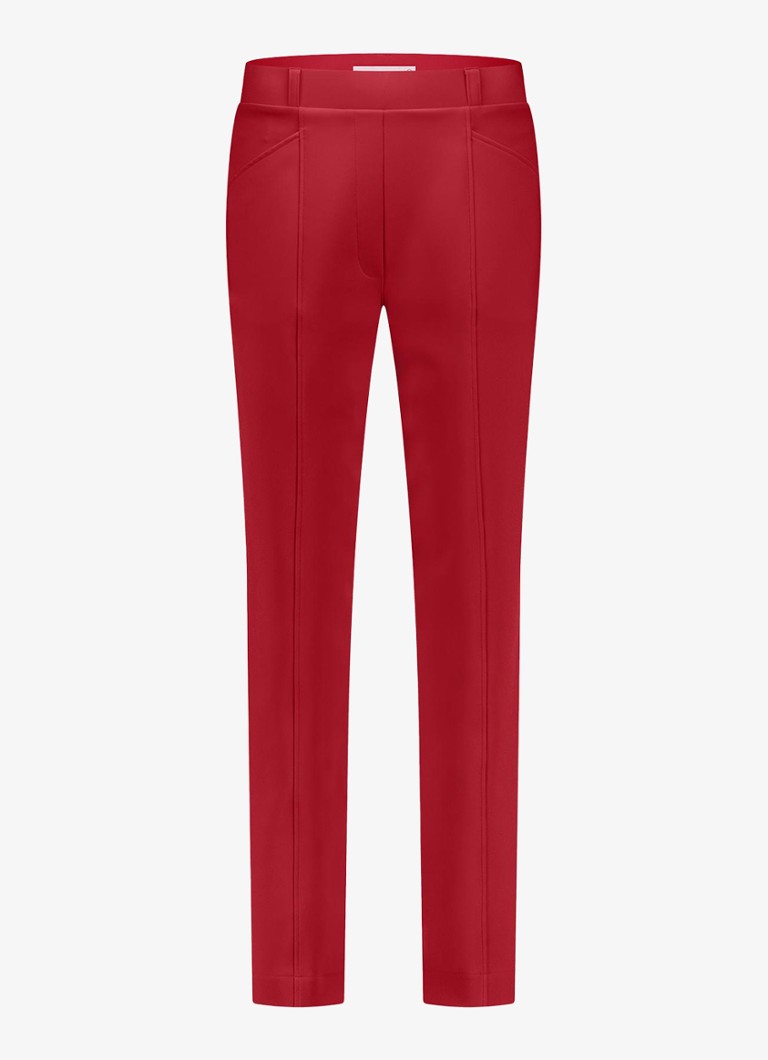 Pantaloni Luca de la Studio Anneloes, cu talie medie, croială mulată și buzunare laterale.