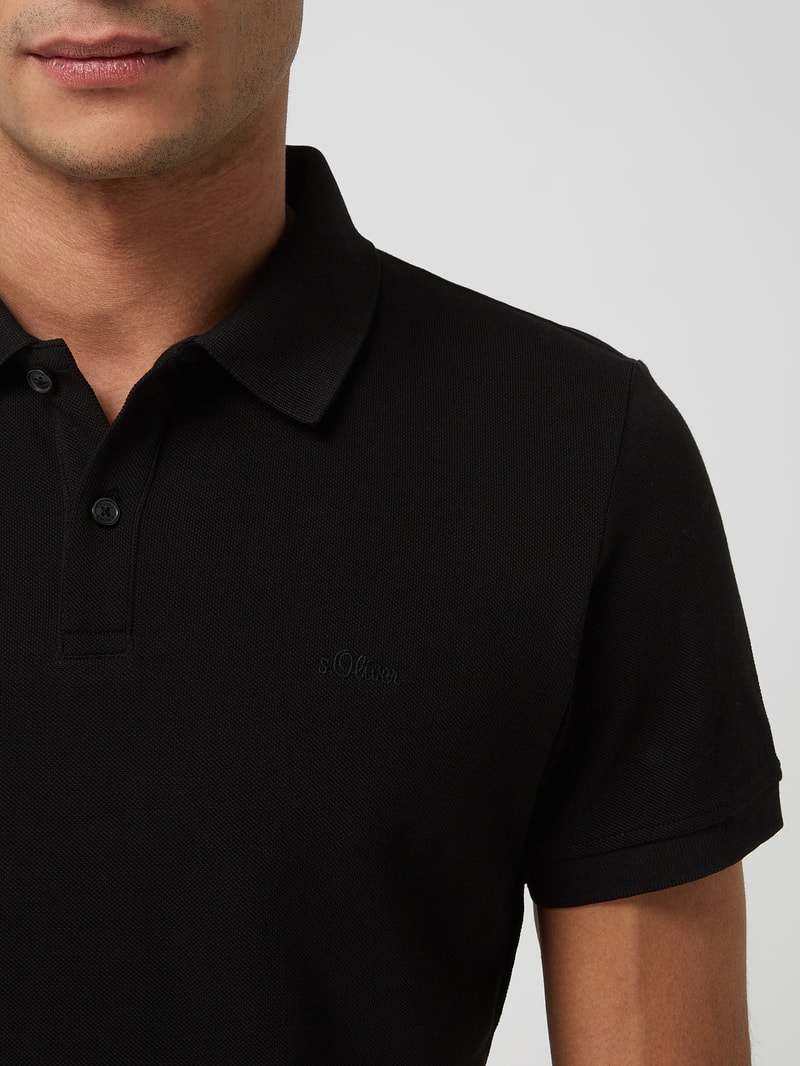 Regular Fit Poloshirt aus Baumwolle in schwarz