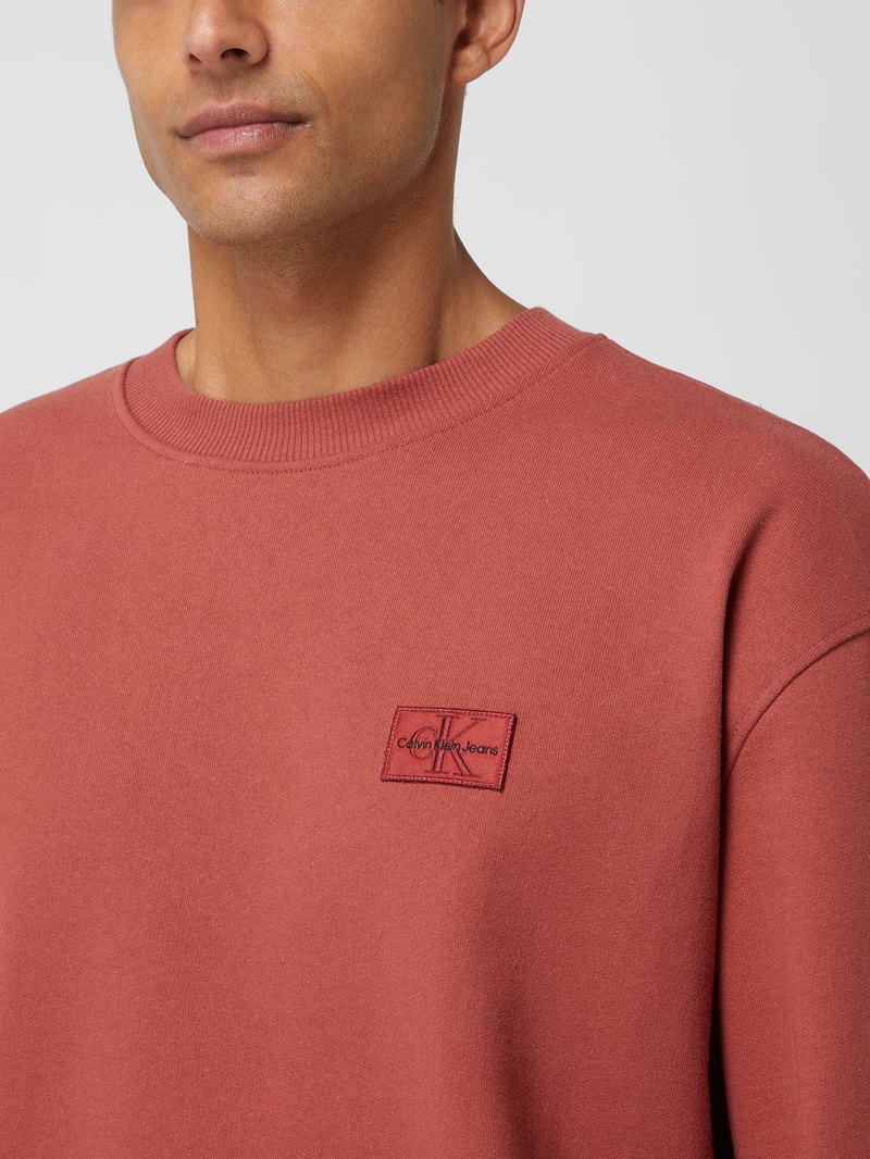 Sweatshirt mit überschnittenen Schultern  in rostrot