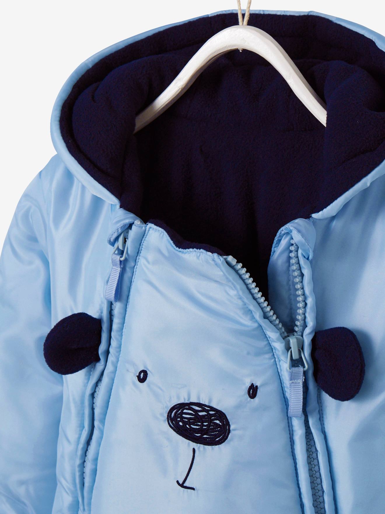 Combinaison-pilote bébé motif frimousse doublée et ouatinée bleu clair