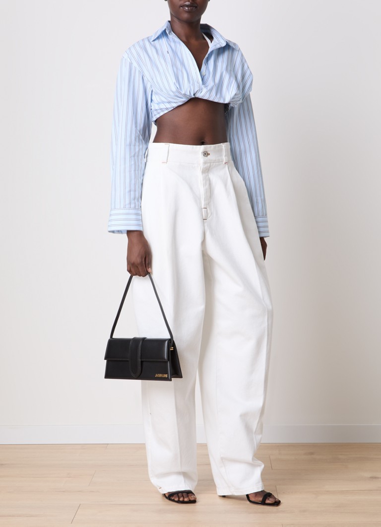 Blugi Jacquemus cu talie înaltă, slim fit, de culoare decolorată.