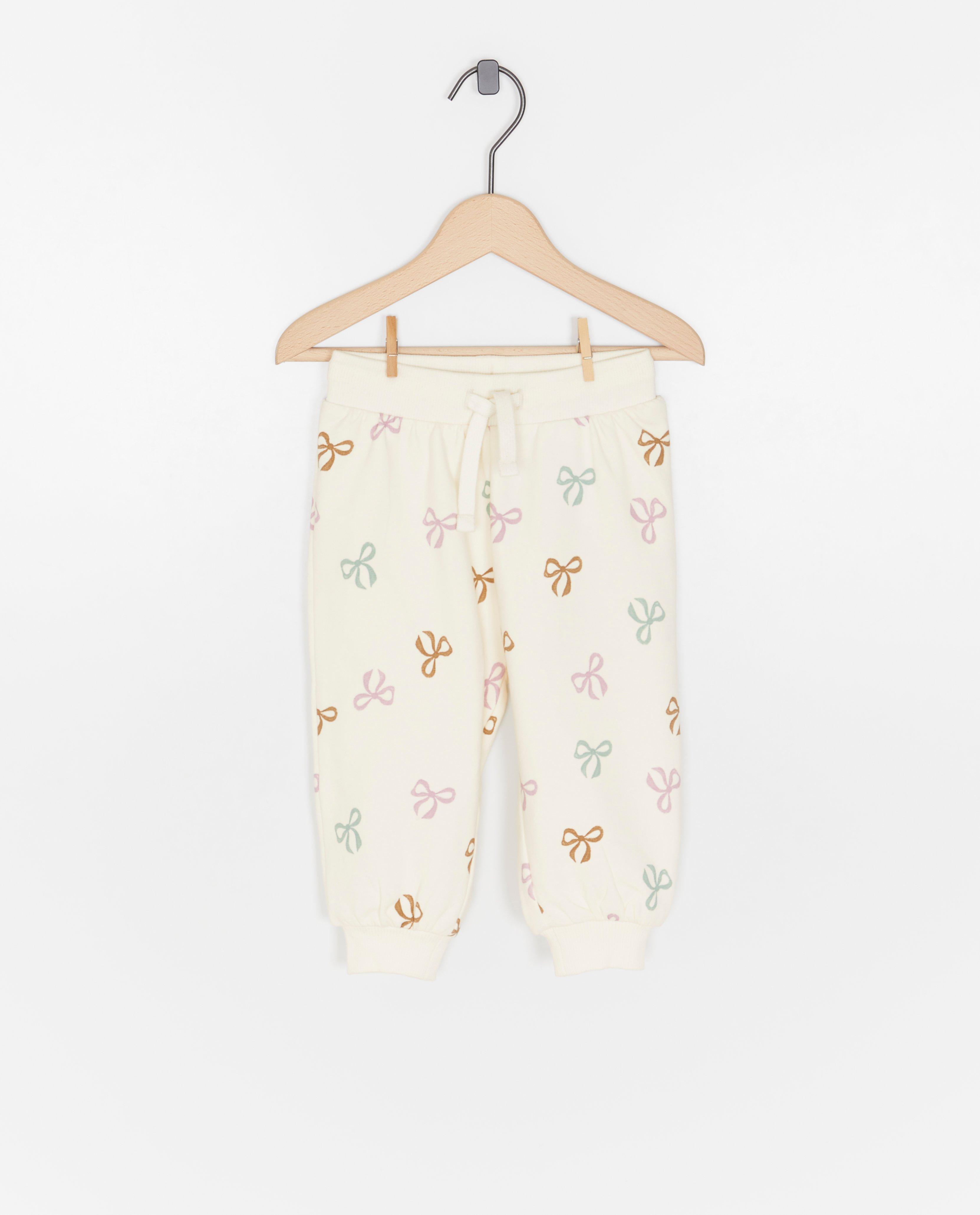 Pantaloni jogging Cuddles and Smiles cu imprimeu de funde albi