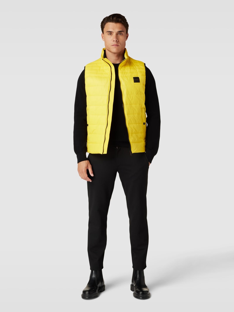 Steppweste mit Label-Patch Modell 'Odeno' in gelb