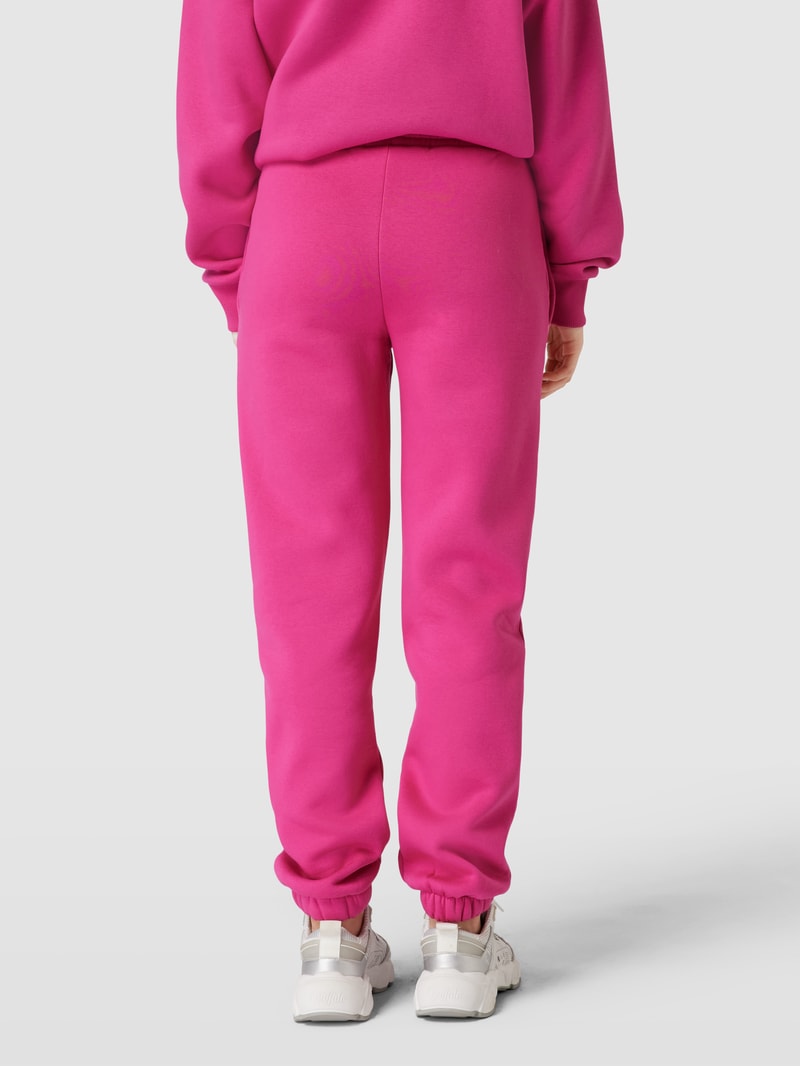 Sweatpants mit Label-Print in fuchsia