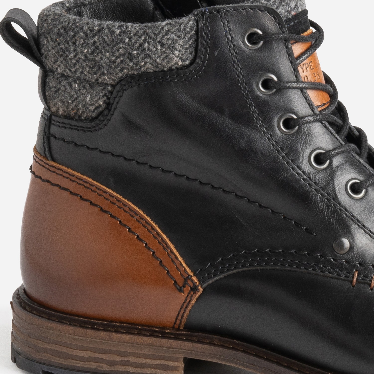 Boots à lacet noir et cognac en cuir