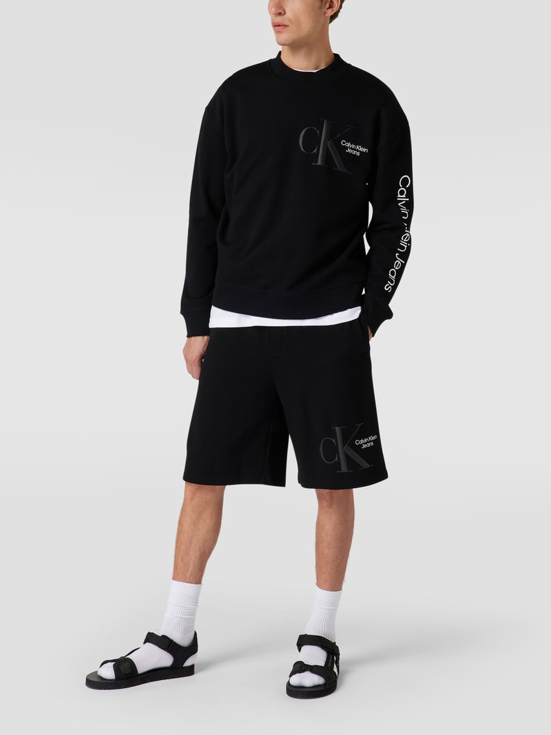 Sweatshorts mit Label-Print in schwarz