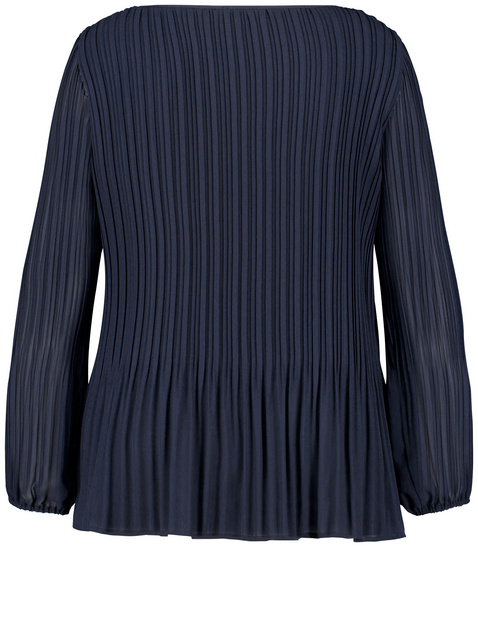Ausgestellte Plisseebluse