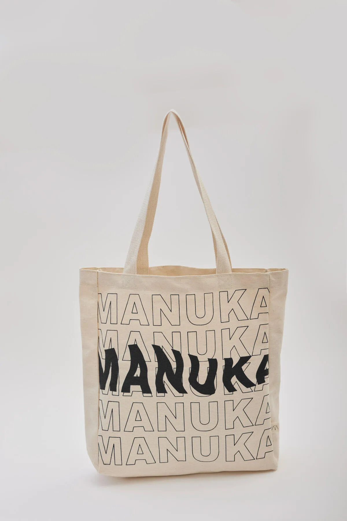 Manuka  Bedruckte Stofftasche mit Seitenfalten – Schwarz