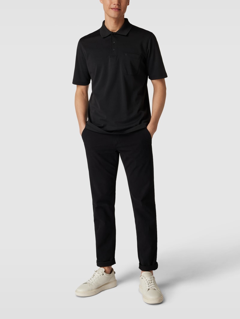 Poloshirt mit kurzer Knopfleiste und Logo-Stickerei in schwarz