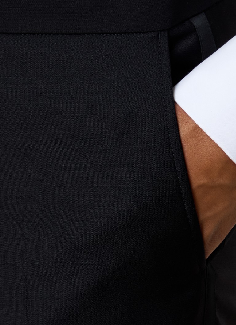Pantaloni eleganți din lână Denz de la Oscar Jacobson, cu o croială rafinată și opțiune de călcare.