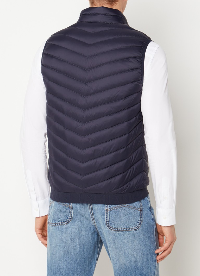 Gilet trapuntato Armani Exchange con imbottitura in piuma e tasche con cerniera.