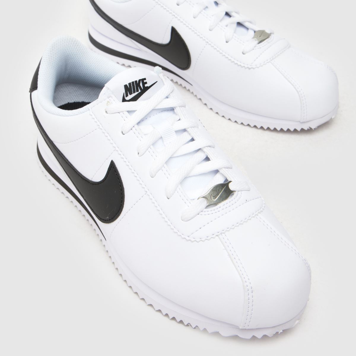 Nike vita och svarta Cortez ungdomsskor