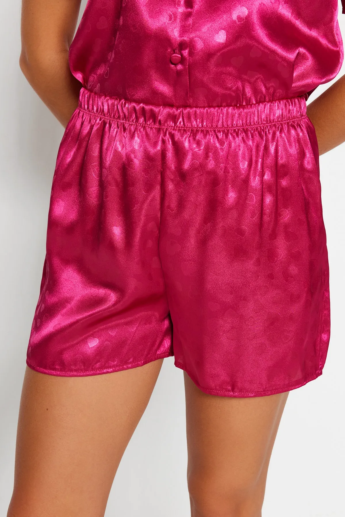 Trendyol Collection  Rosa Pyjama-Set aus gewebtem Satin mit Herzen THMSS23PT00237