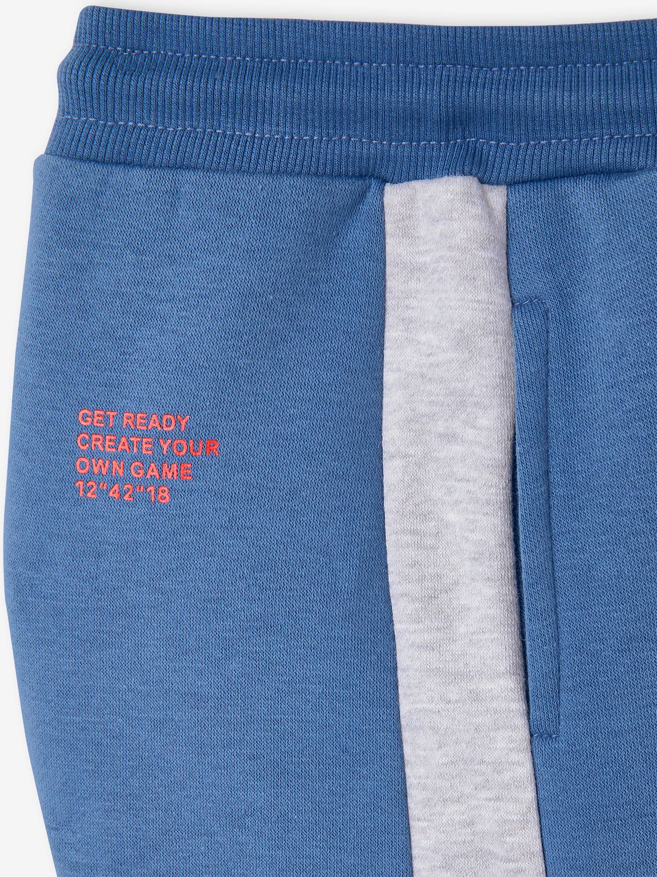 Pantalon jogging bandes côtés garçon. vert sapin