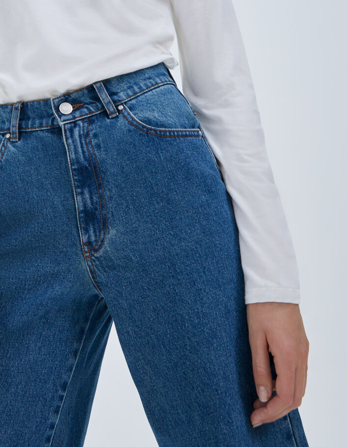 Jean large bleu taille haute 7/8e bas frangés Femme