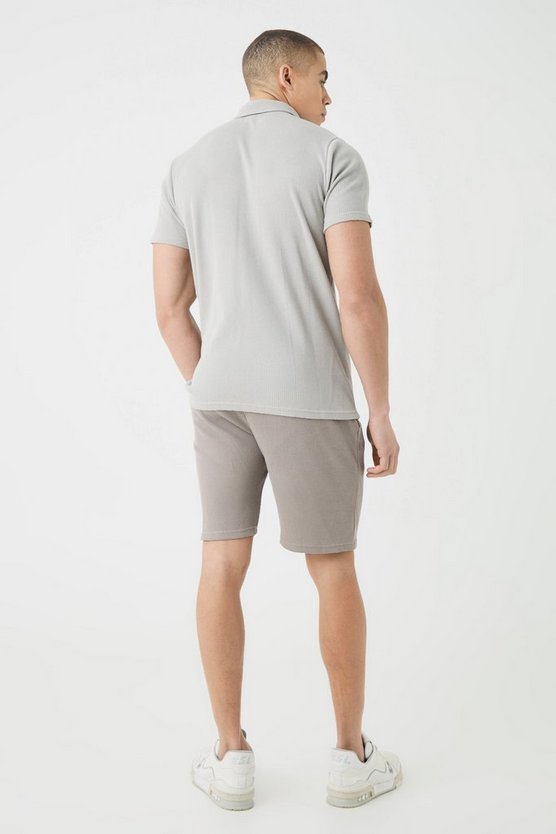 Slim-Fit Poloshirt in Waffeloptik mit 1/4 Reißverschluss