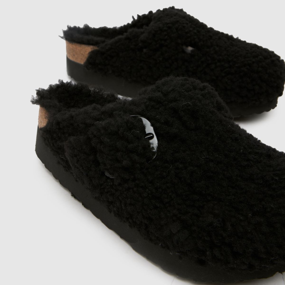 BIRKENSTOCK – Boston – Svarta sandaler med stort spänne i fårskinn