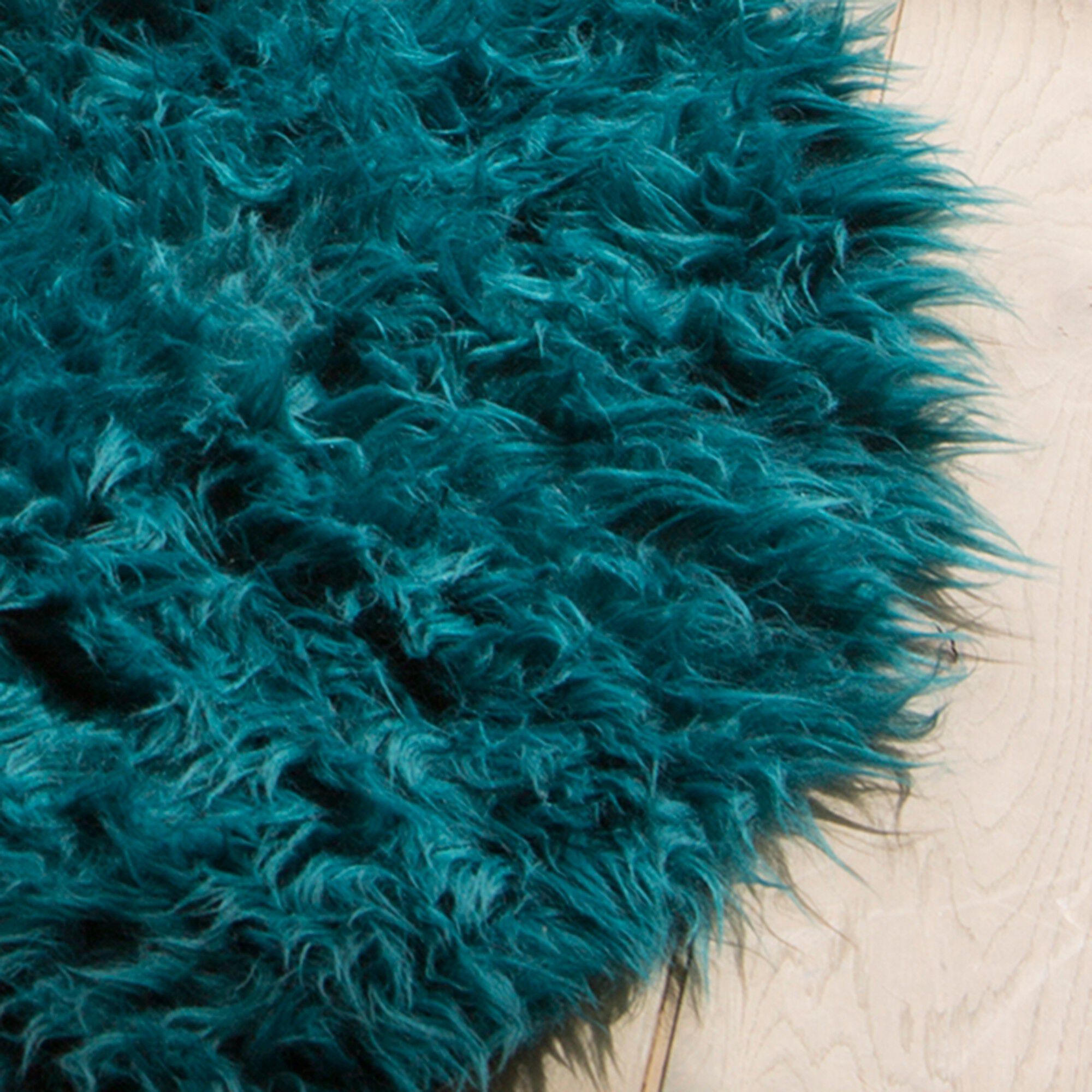Tapis rond poils longs