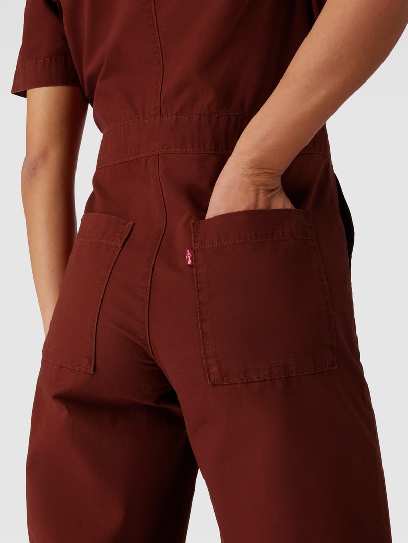 Jumpsuit mit Brusttaschen in olivgrün