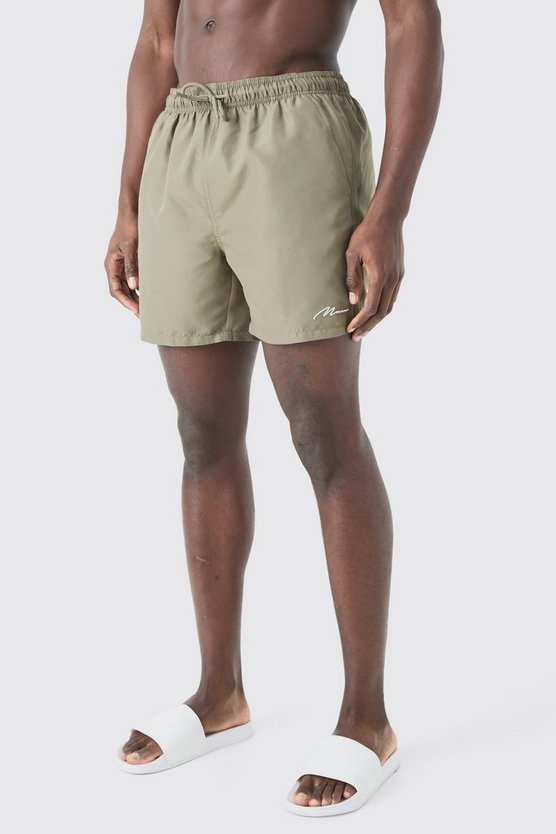 Man Signature mittellange Badehose