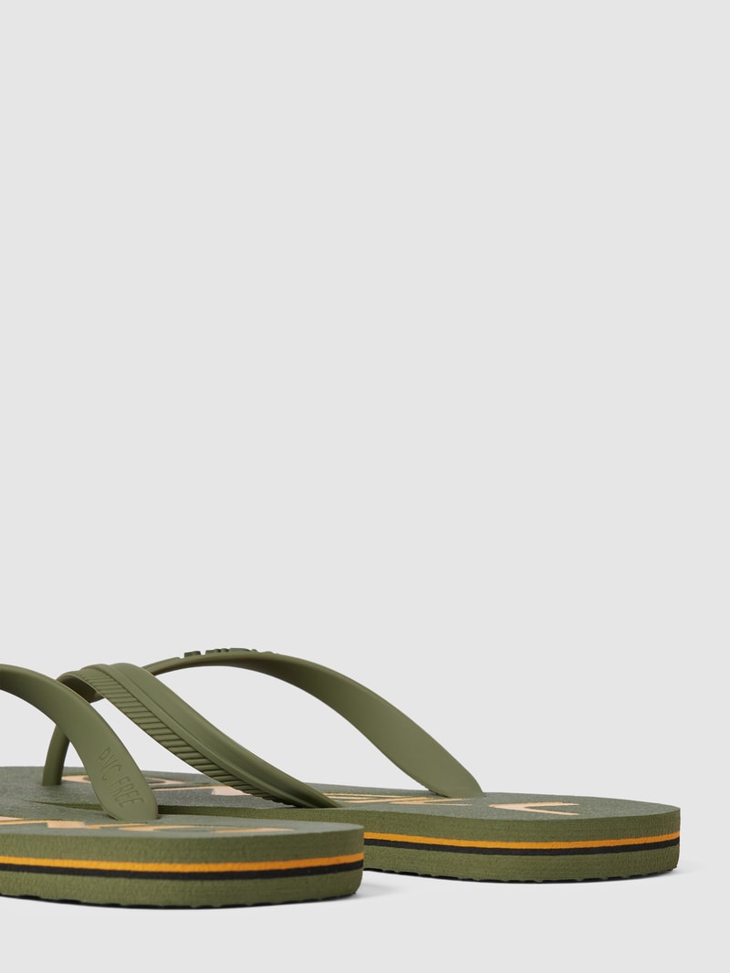 Slides mit Label-Applikation in khaki