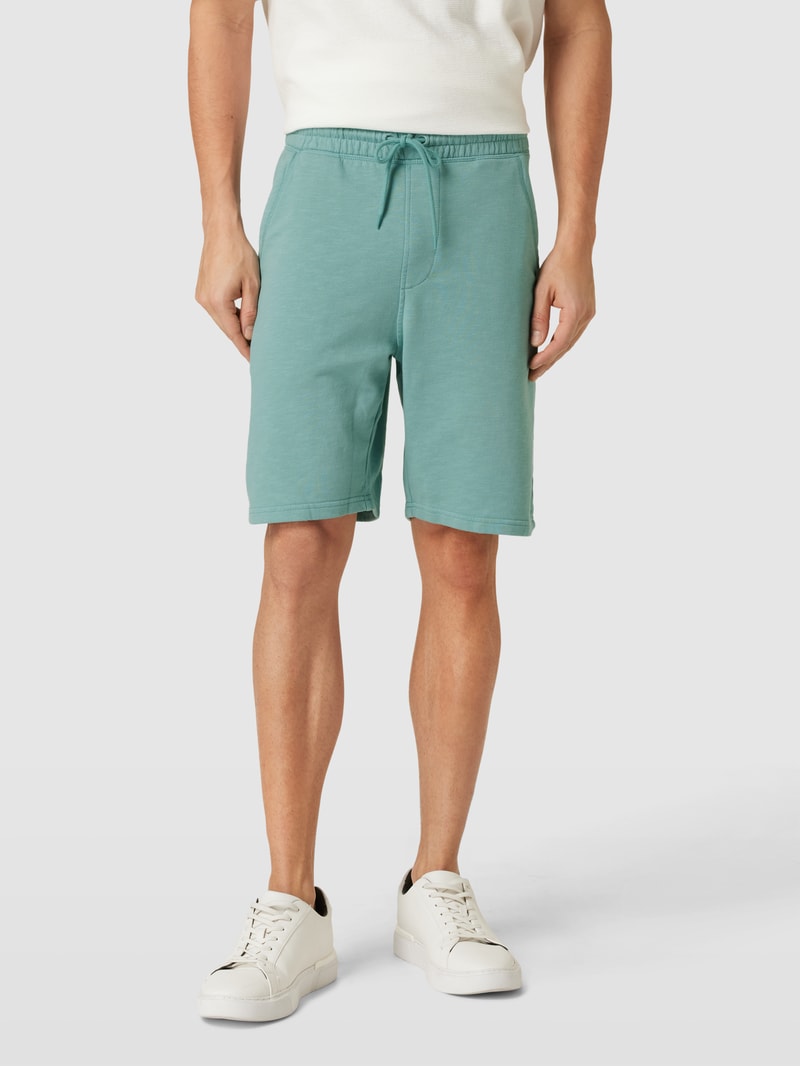 Shorts mit seitlichen Eingrifftaschen in helltürkis