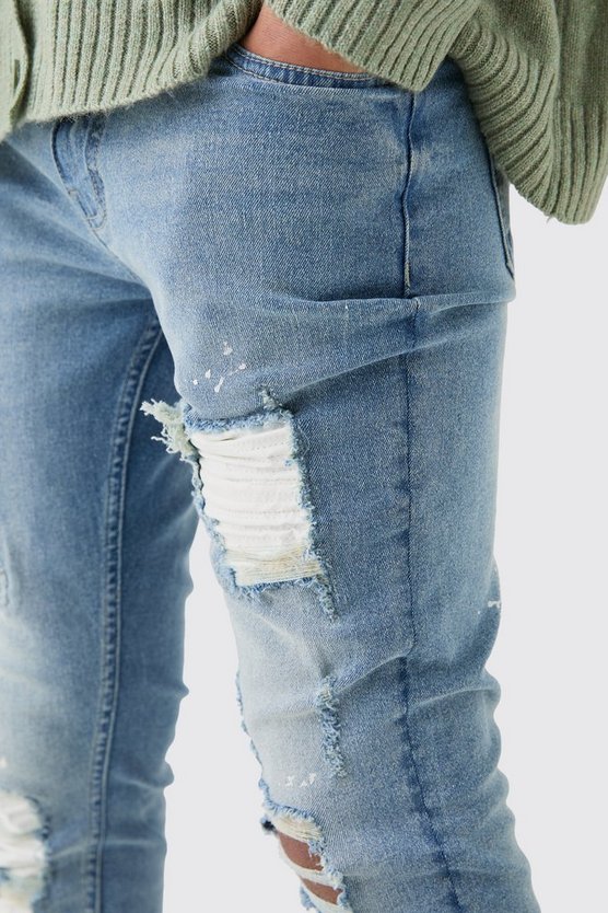 Weiße Skinny Stretch Bikerjeans mit Rissen