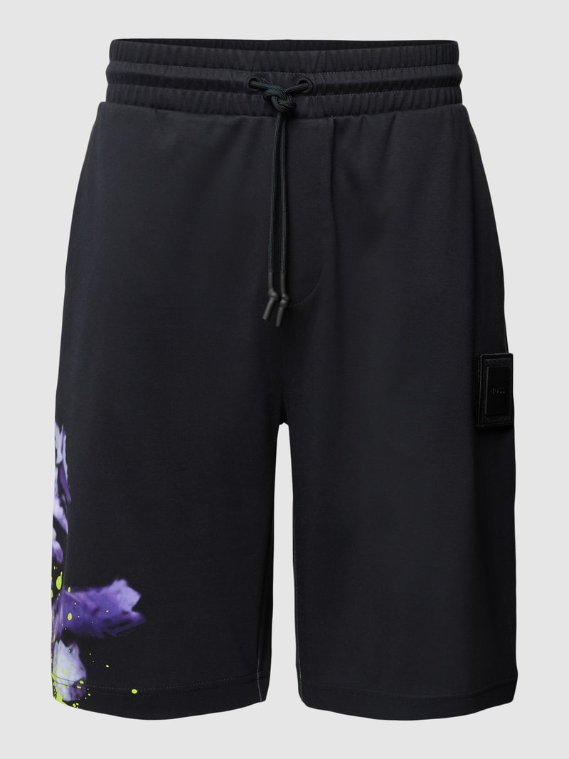 Sweatshorts mit Motiv-Print Modell 'Lotus' in schwarz
